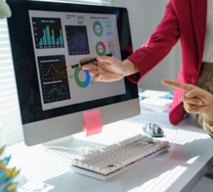 Business professional analyzing CRM dashboard using Green Lines software for customer management and automation